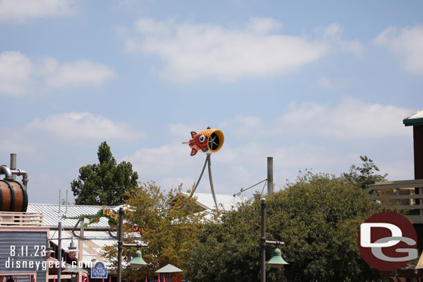 A wind turbine over the trees