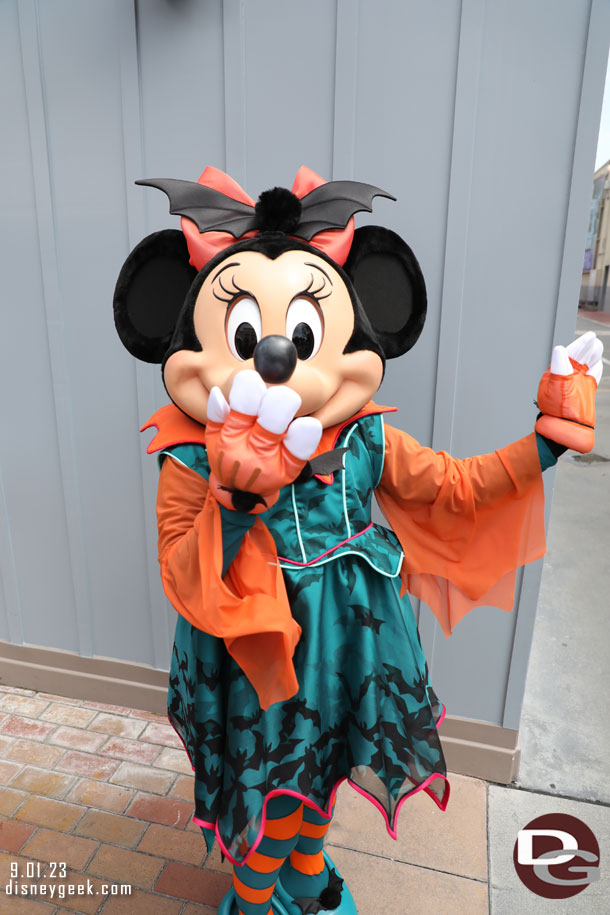 Minnie Mouse stood next to me.. she has a new Halloween outfit too.