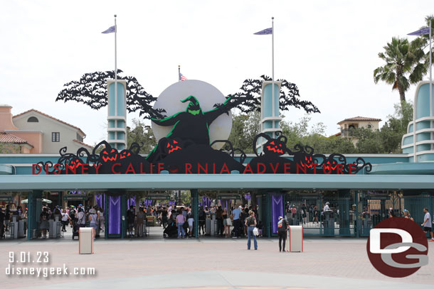 Disney California Adventure entrance features its traditional Halloween signage, Disney100 is gone.