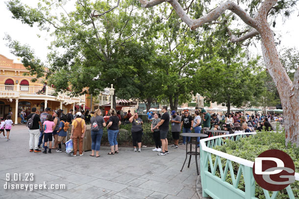 The popcorn line wrapped around the planter in Frontierland