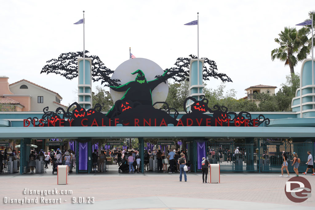 Disney California Adventure entrance features its traditional Halloween signage, Disney100 is gone.