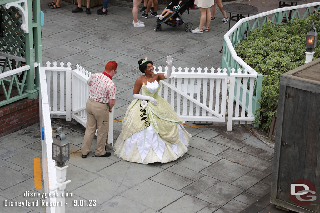 They held the boat for Tiana to board.