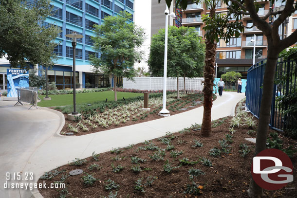 The fences are down and the new smaller lawn and walkway leading to the Discovery Tower is visible.