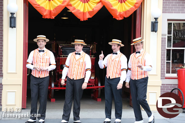 The Dapper Dans of Disneyland in their Halloween orange