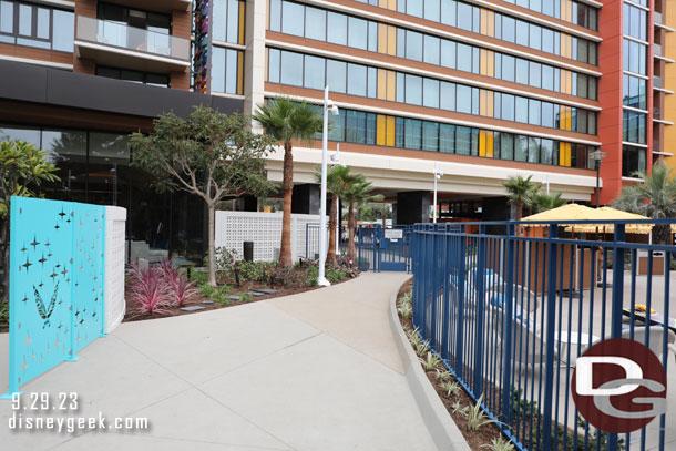 Down this path is an entrance to the pool area.  The new pool and existing pools are all connected and to guests staying in any of the four towers.