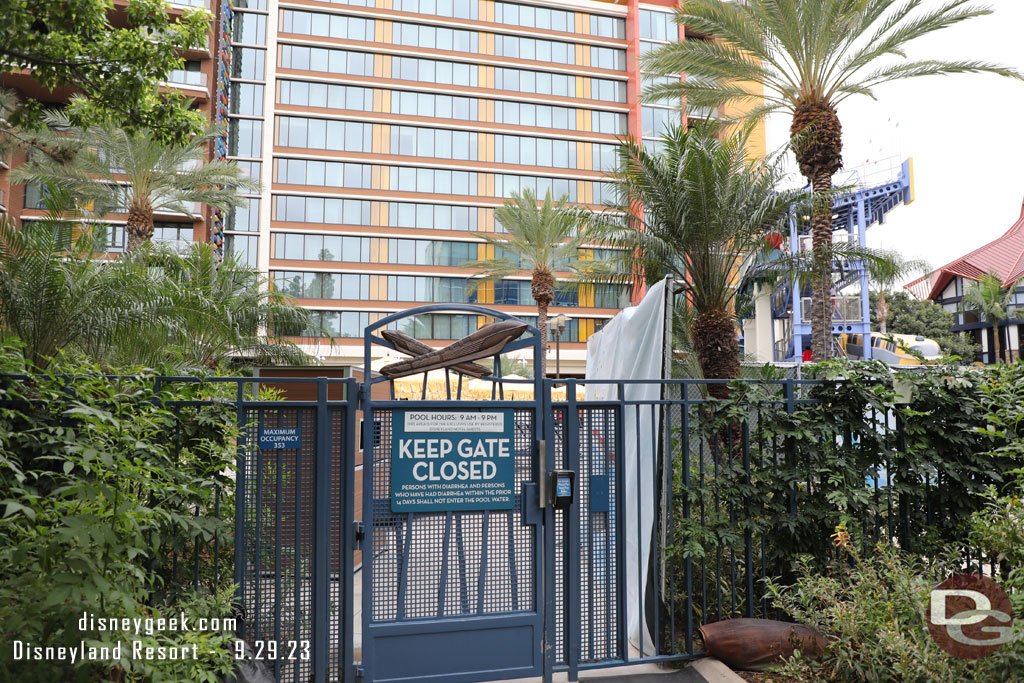 Some fences up in the pool area, hard to tell what work is going on.