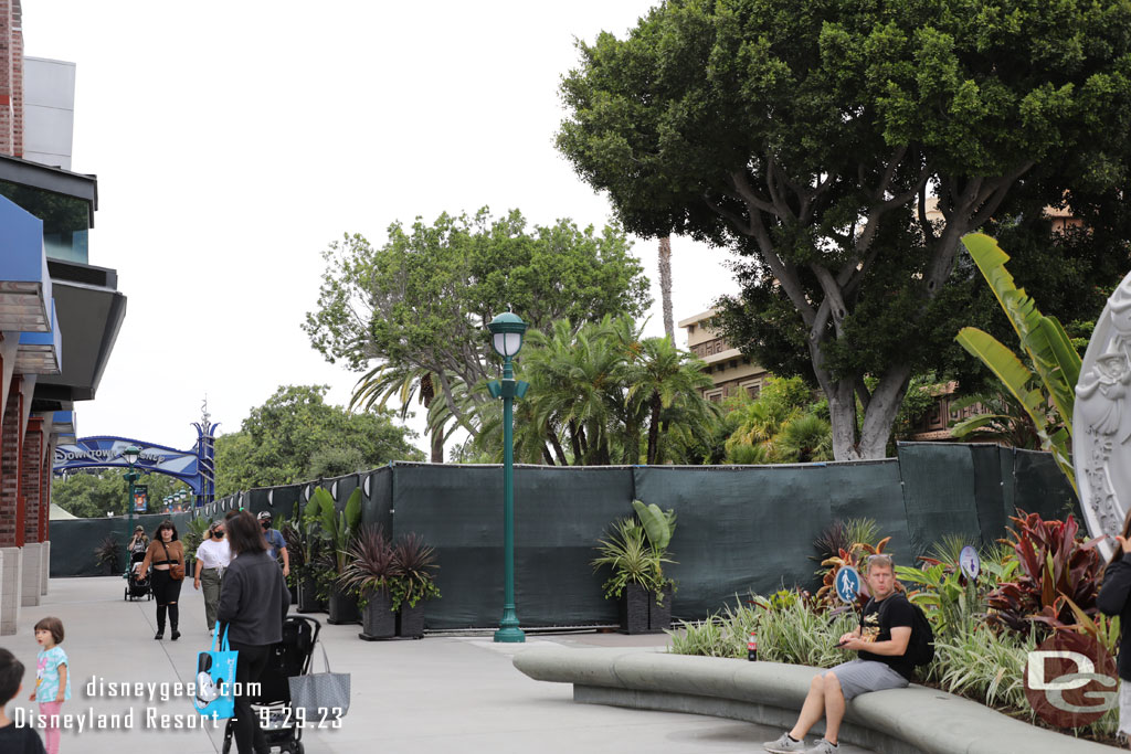 Fences still up for pavement work leading to the parking lots