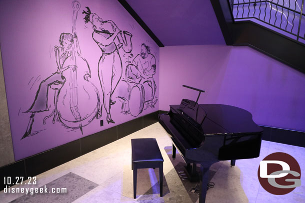 Soul artwork and a piano by the stairs