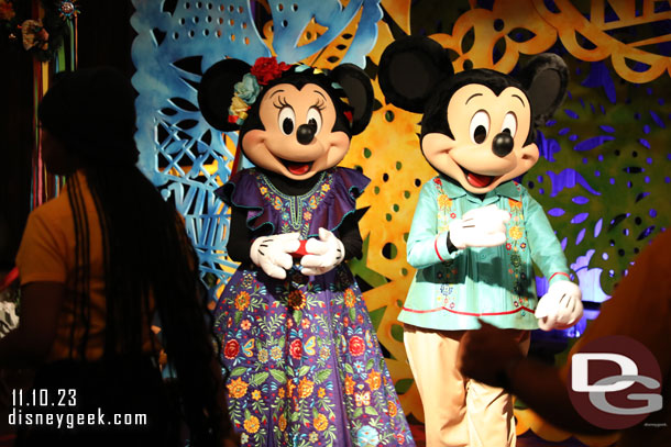 Mickey Mouse and Minnie Mouse out for pictures 