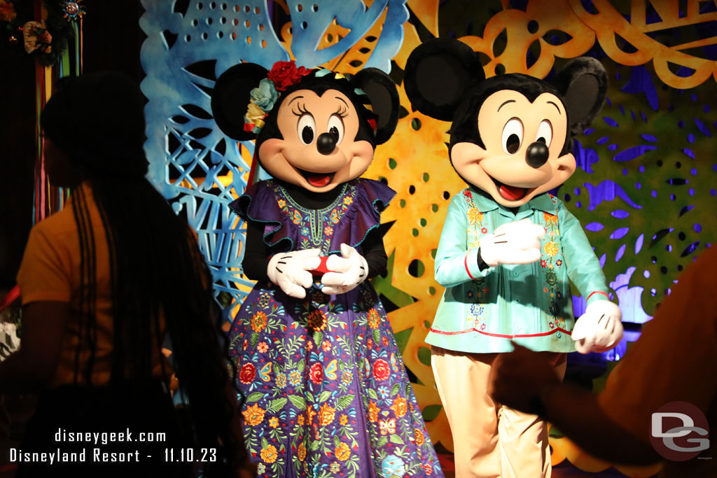 Mickey Mouse and Minnie Mouse out for pictures 