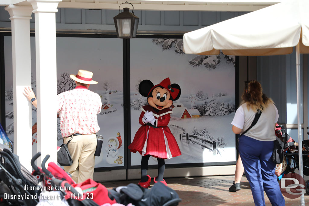 Minnie Mouse greeting guests