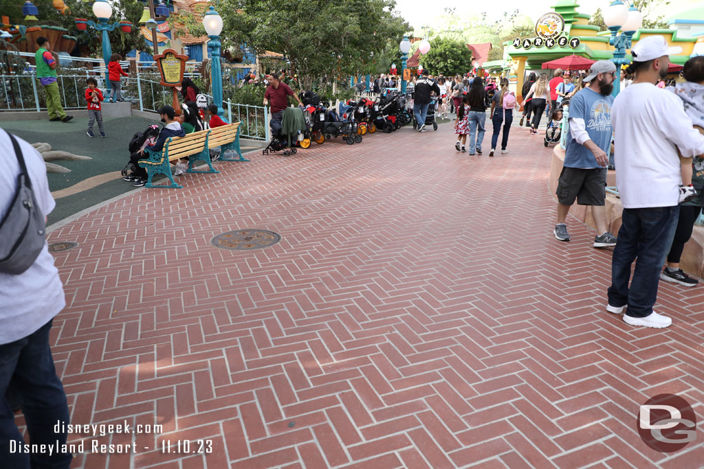 The turf walkway near the fountain in CenTOONial park is now bricks