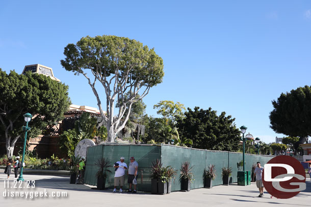 Fences still up for concrete work in the center where the old stage used to be.