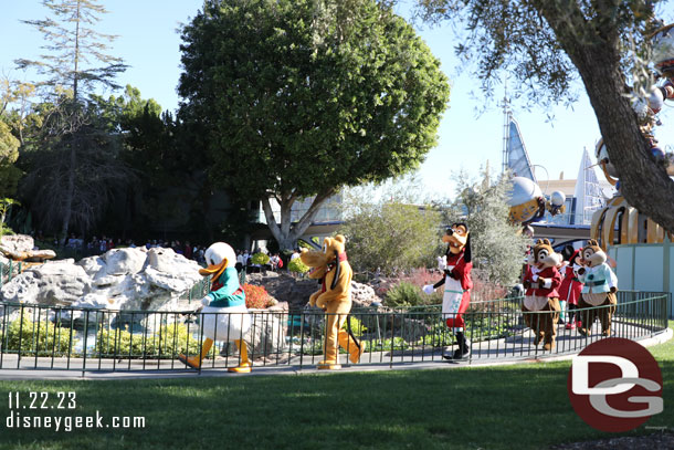 Donald Duck leading the characters to the castle to join the Disneyland band