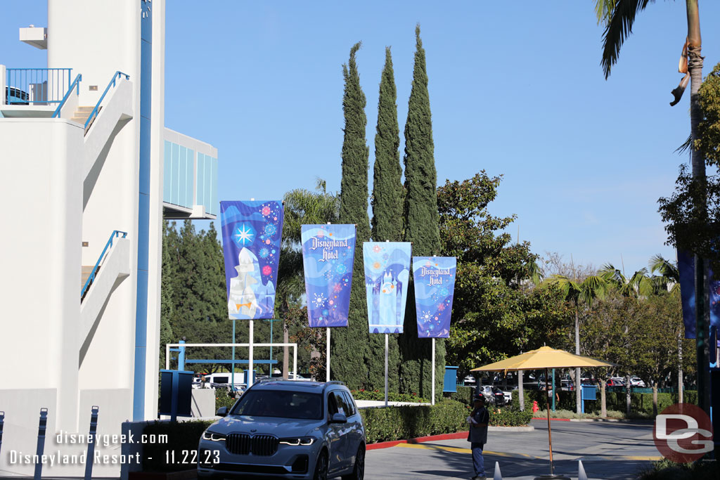 Banners line the driveway of the Disneyland Hotel