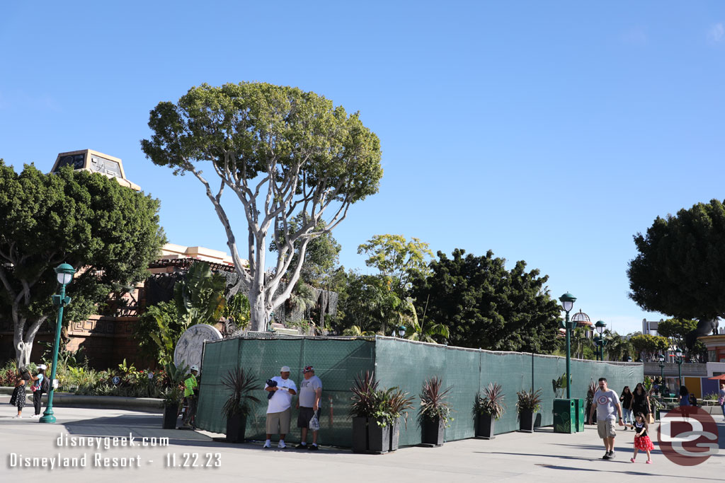 Fences still up for concrete work in the center where the old stage used to be.