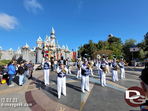 Paused to listen to the Disneyland Band at Sleeping Beauty Castle