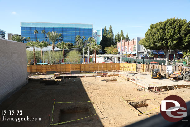 Forms up and some holes dug in the open space between the buildings and Monorail station