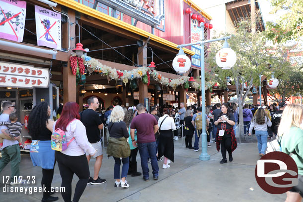 The queue was filled and spilled over blocking the gift shop.