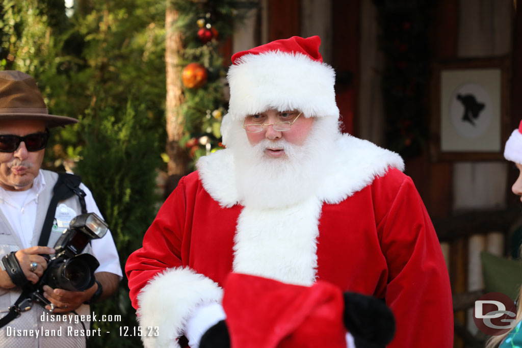 Santa was out his time by and he was visiting with those in the queue (and standing in the area)