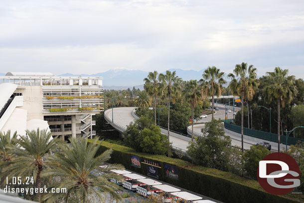 Some snow on the mountains in the distance.