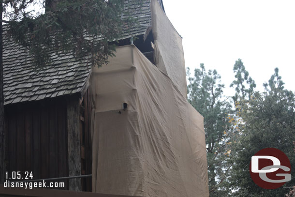 Scaffolding and scrim still obstruct the view of the entrance facade work.