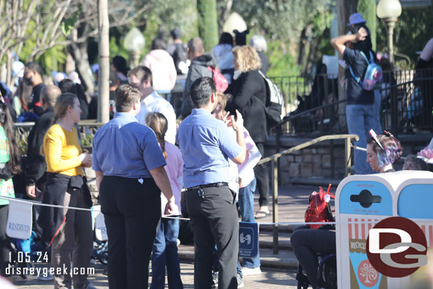 Two cast members preparing to sign the parade