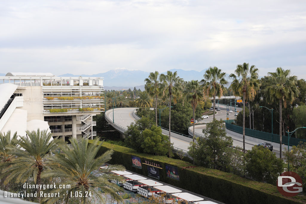 Some snow on the mountains in the distance.