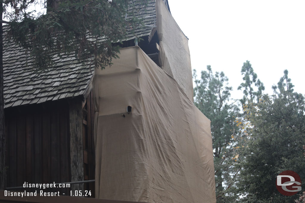 Scaffolding and scrim still obstruct the view of the entrance facade work.