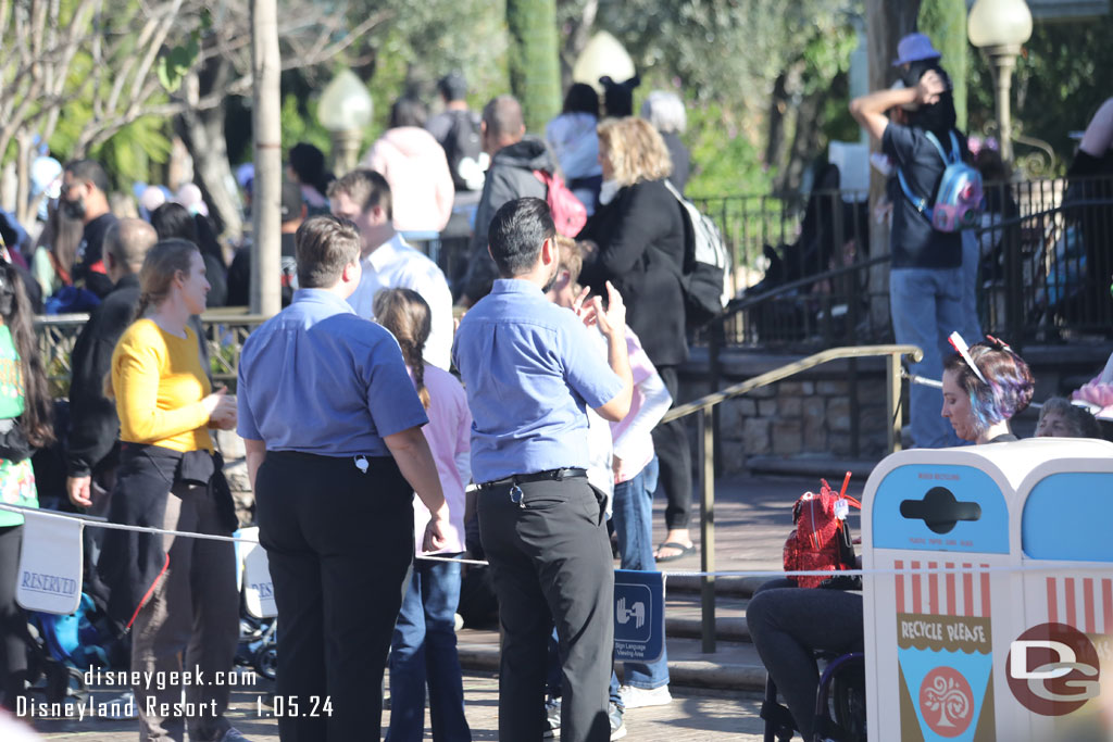 Two cast members preparing to sign the parade