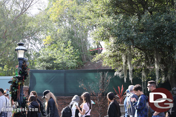 Work on the berm behind the queue.