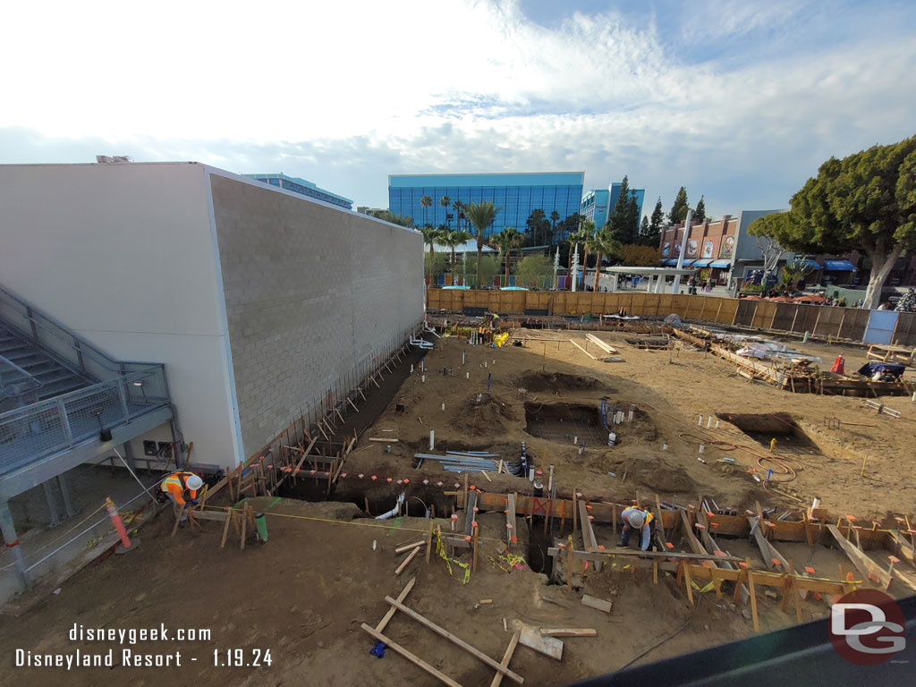 Forms and holes for footers in the area between the new building and the Monorail station.  The trenches we saw last time have been covered.