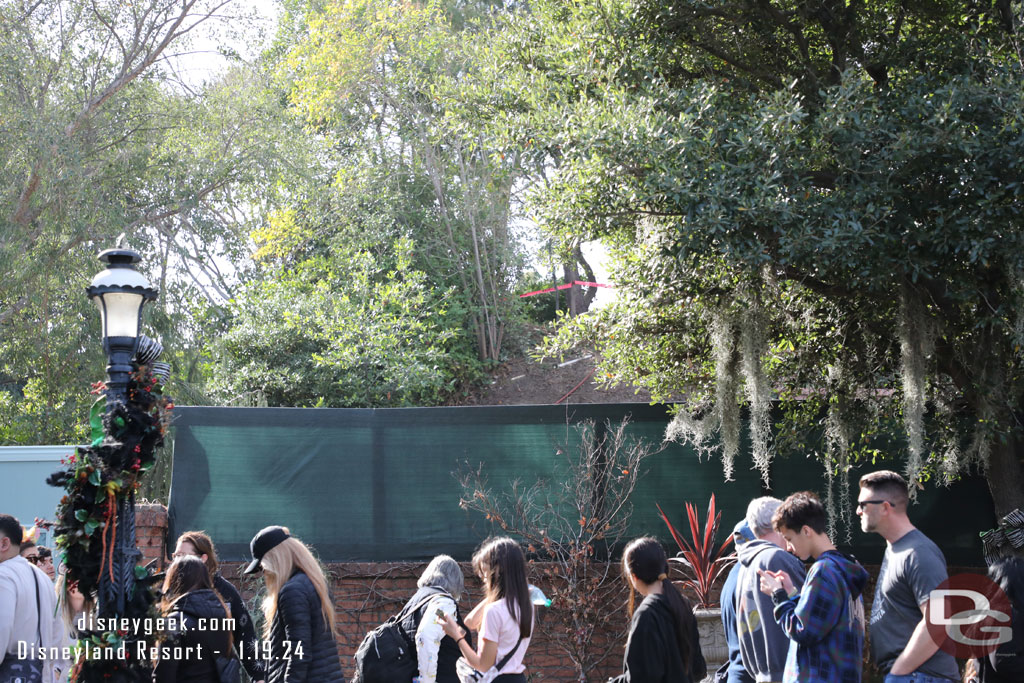 Work on the berm behind the queue.