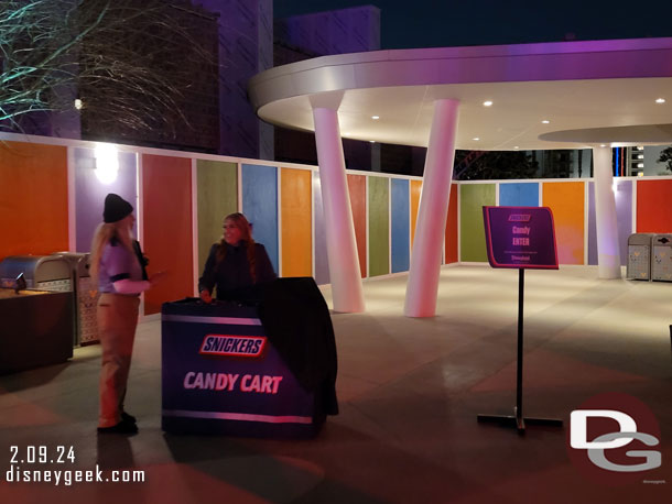 A candy cart passing out snack size snickers bars