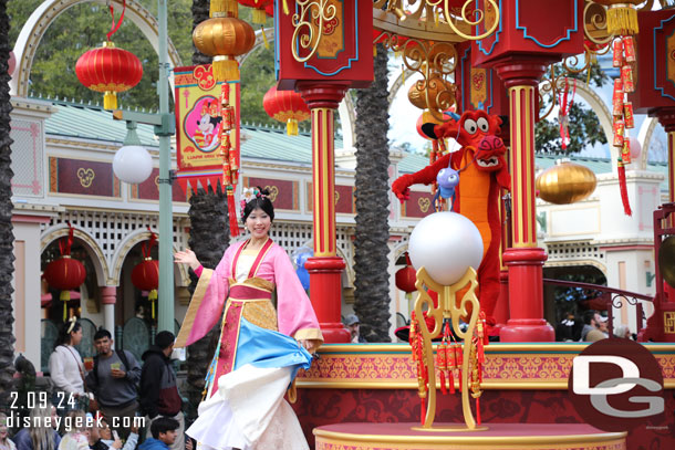 Mulan and Mushu in Mulan's Lunar New Year Procession