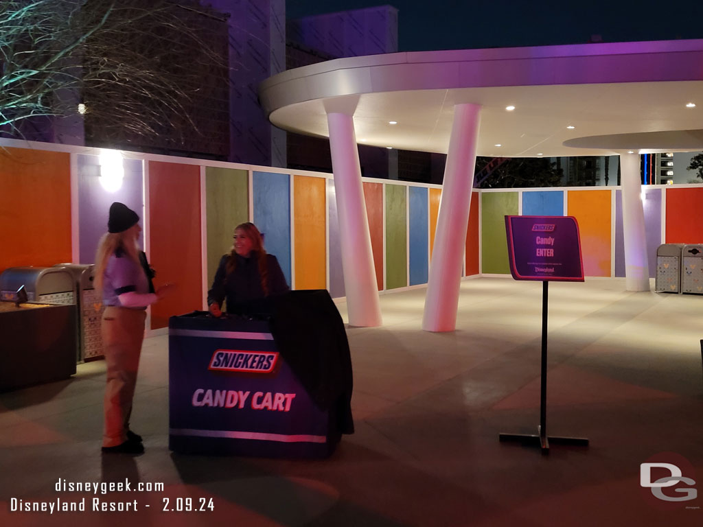 A candy cart passing out snack size snickers bars