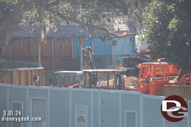 Looking toward the train station, walls are up on the platform.