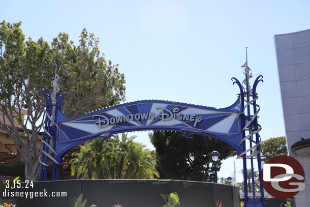 Fences up around the Downtown Disney sign for the walkway project