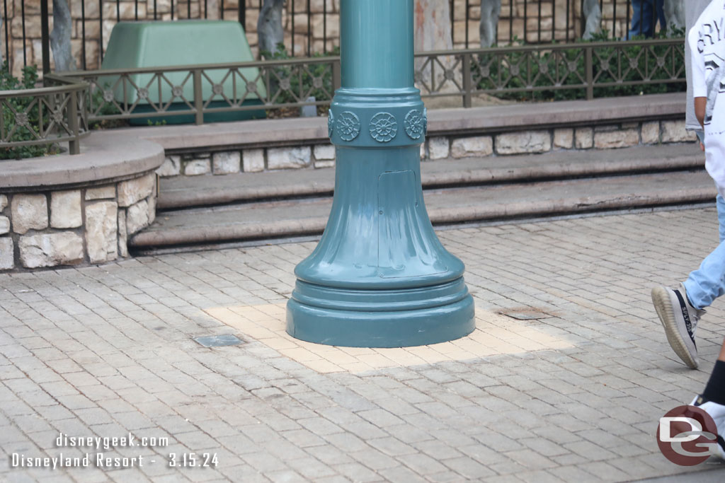 The walls around down from around the posts in the small world mall area