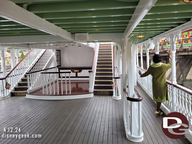 The cruise was not crowded.  Tiana waving to a passing train.