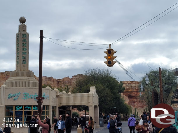 A large crane backstage beyond Cars Land