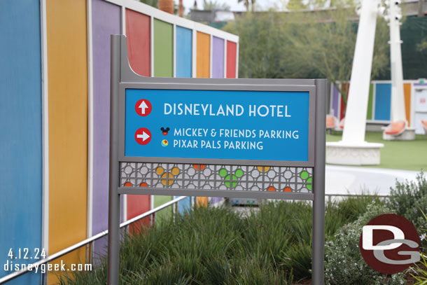 It shows the Disneyland Hotel as being straight that way, which looks to be pointing to the new security checkpoint that is still under construction.  Is the sign mis-angled, the arrow off, or is the plan to have hotel guests use the new entrance?