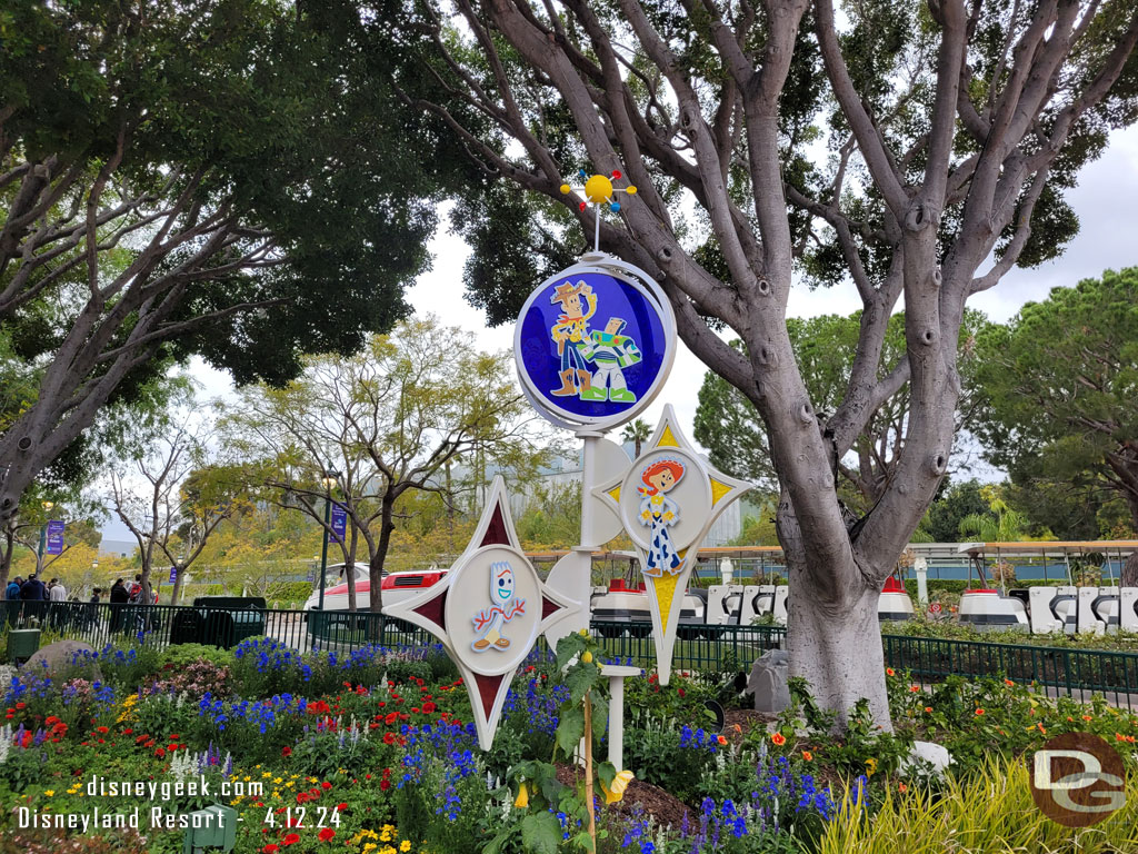 Another Pixar Fest display near the fountain and the tram stops.