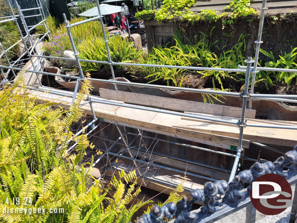 Scaffolding up on the area below the bridge