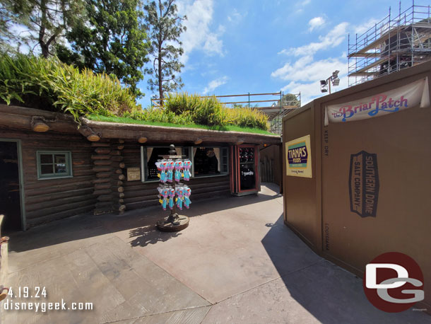 A temporary Briar Patch sign on the wall on the right one of the last Splash Mountain references in the area.