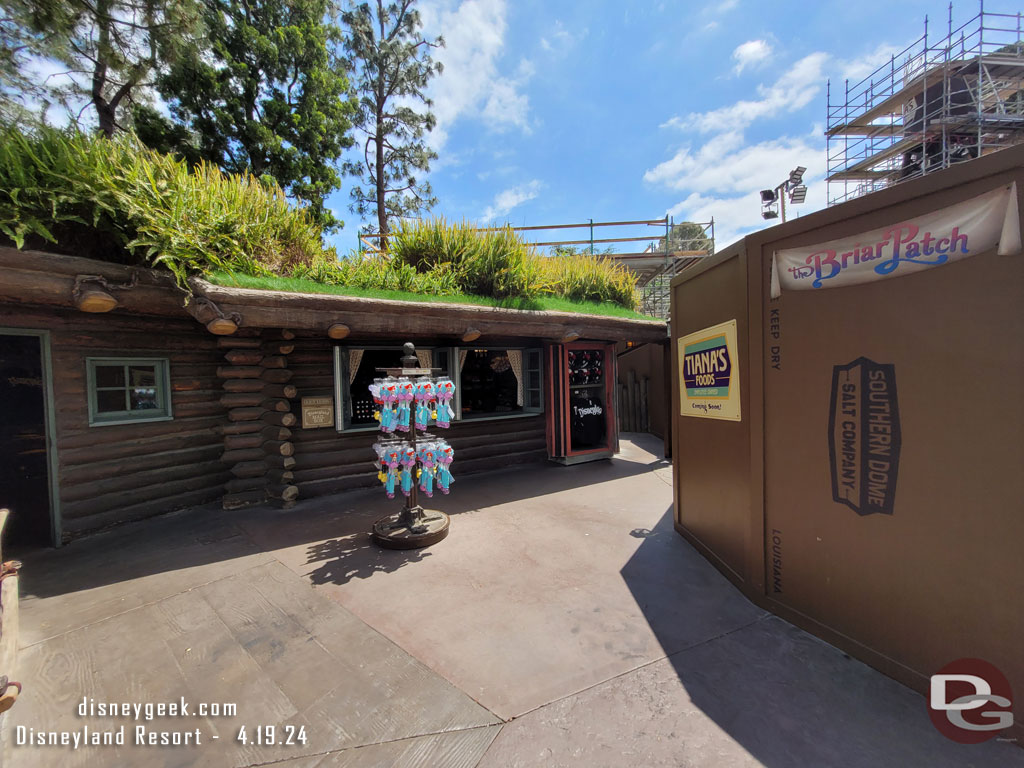 A temporary Briar Patch sign on the wall on the right one of the last Splash Mountain references in the area.