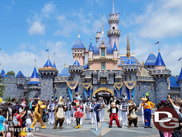 The characters join the band and prepare to march to Town Square