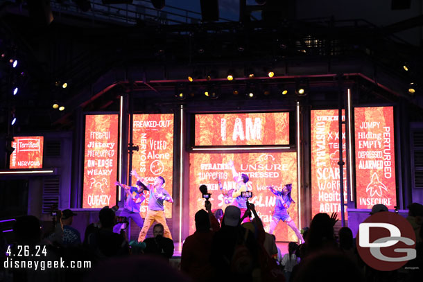 The stage features dancers throughout the evening