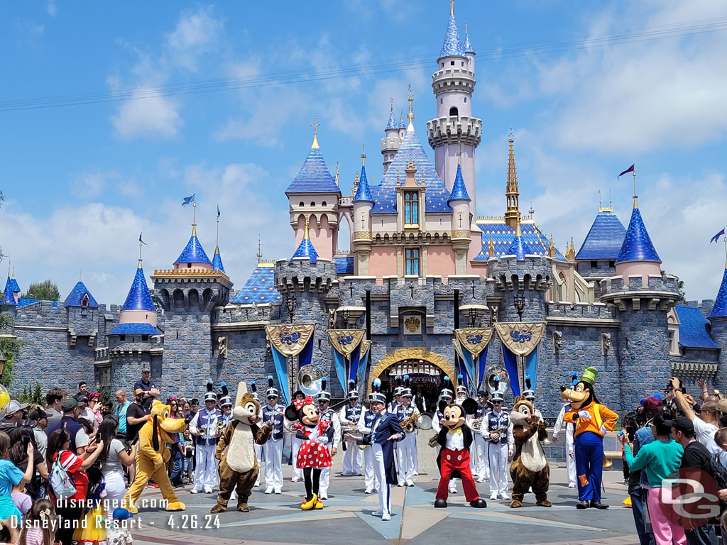 The characters join the band and prepare to march to Town Square