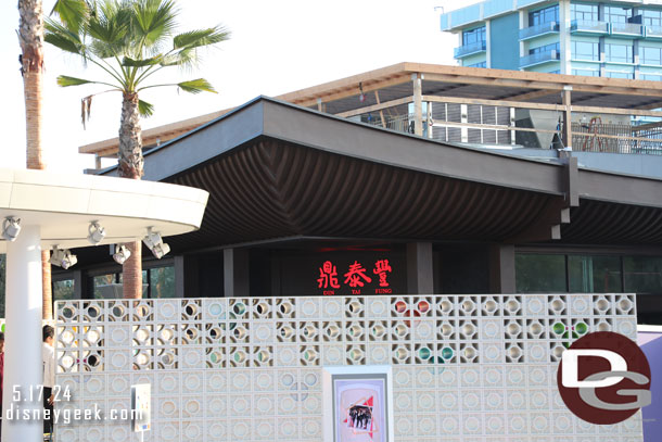 Din Tai Fung looks like it will be opening soon. The signs are installed and were on today.  Also some of the walls have been replaced with fences on the lawn side